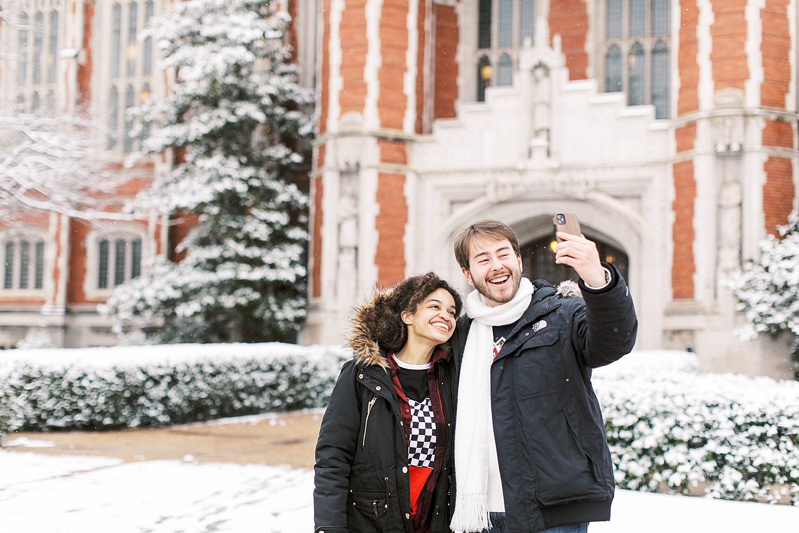 ou students taking selfie in snow