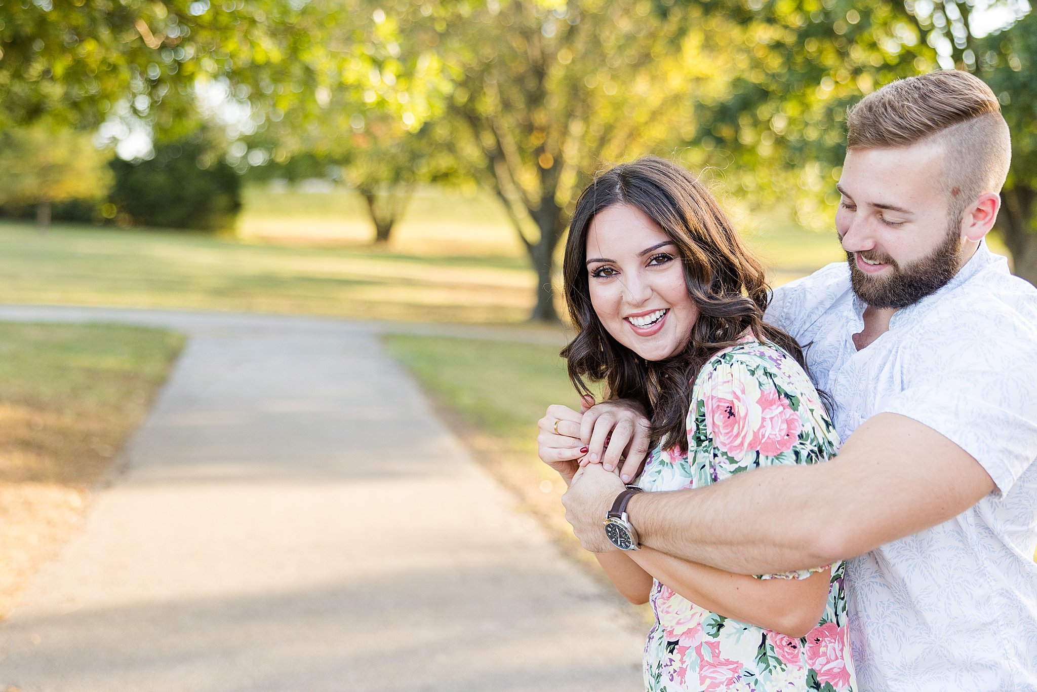 couple laughs during photos for bartlesville mini session photographer 