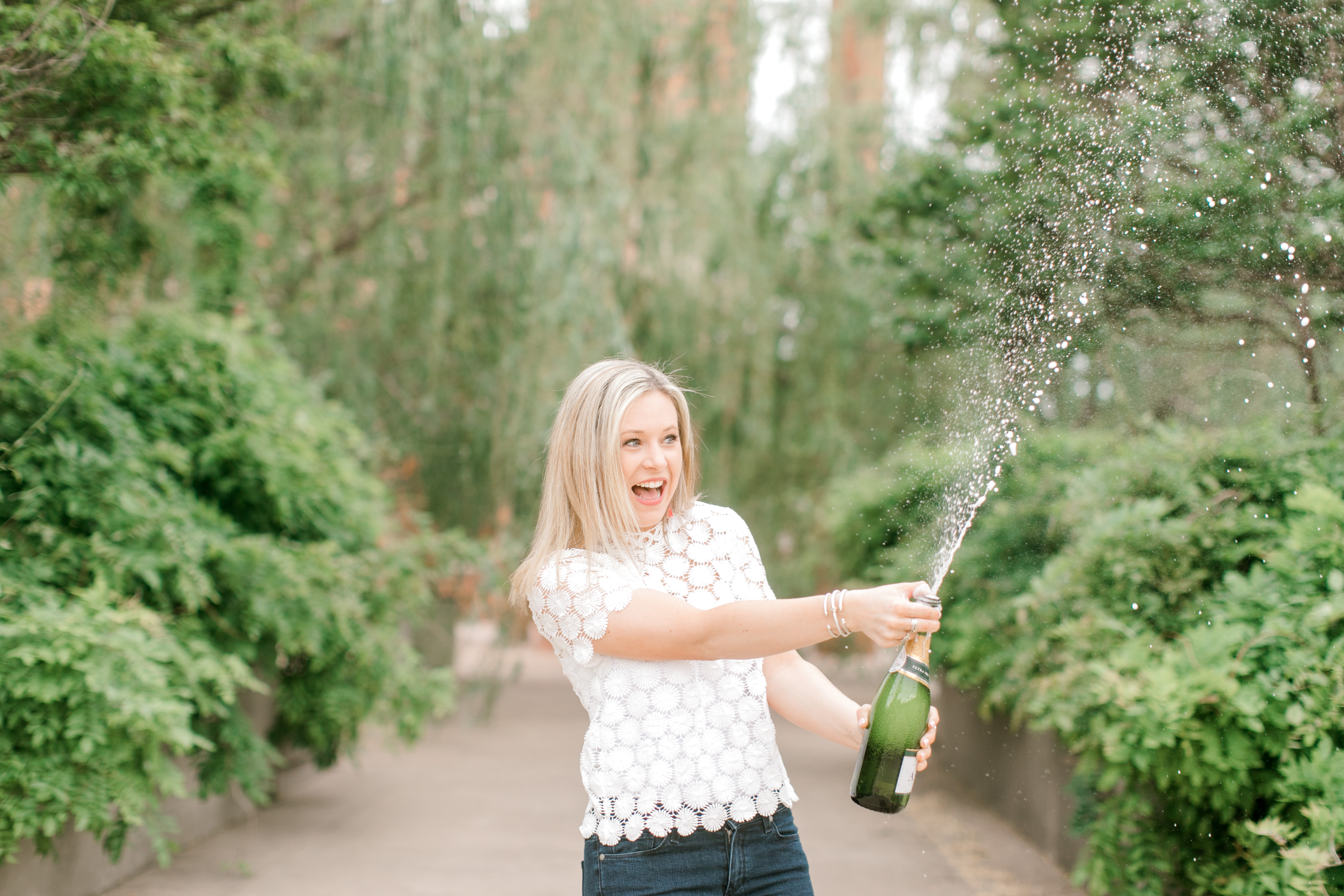 how to pop champagne for graduation photos