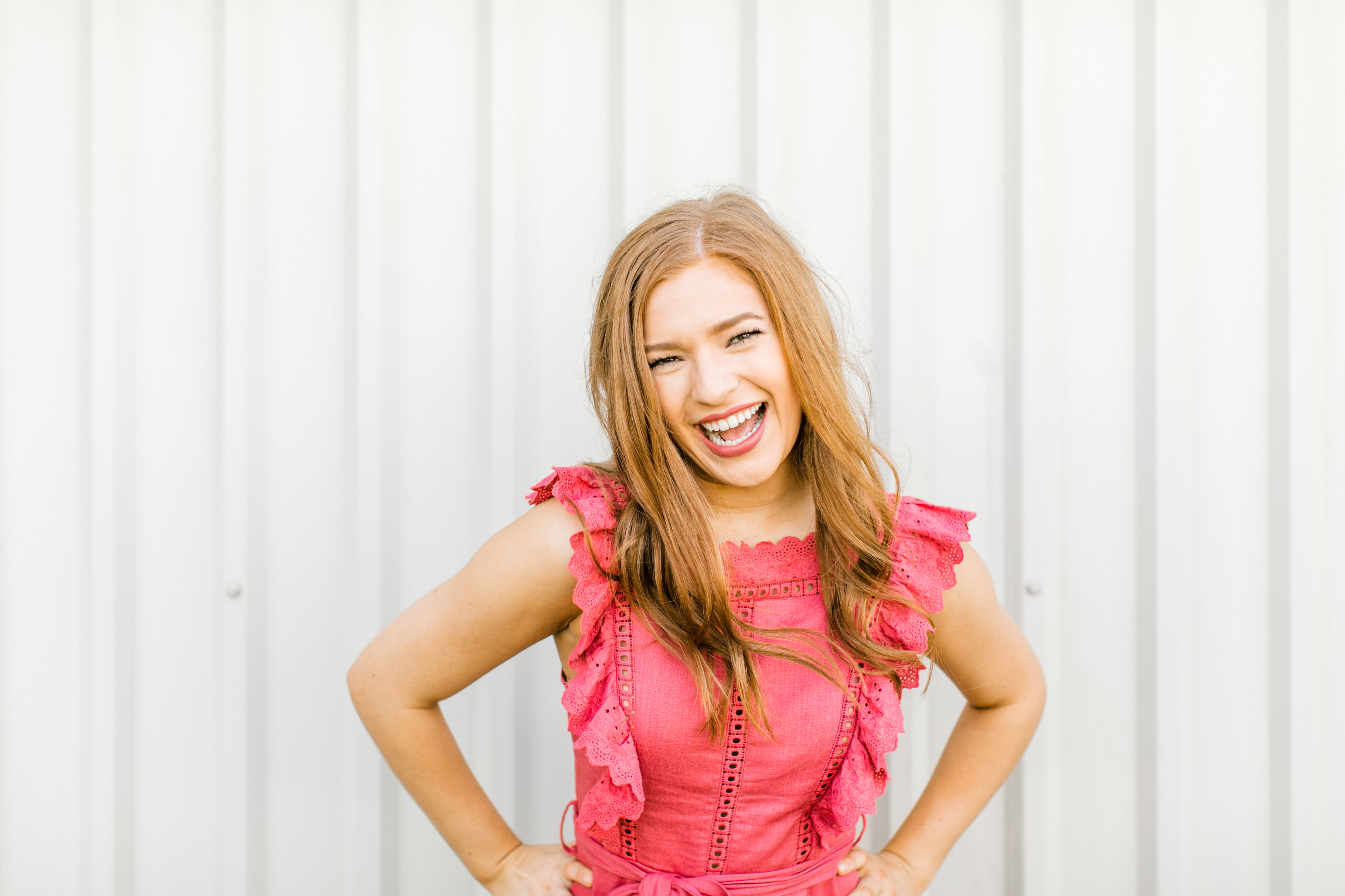 redhead smiles with hands on hips for norman oklahoma photographer