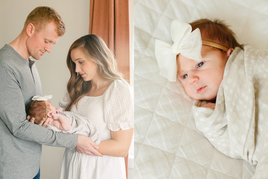 mom and dad hold newborn baby, baby lays on bed wrapped in blanket