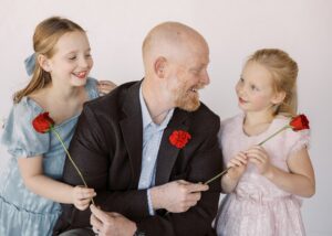 Dad shares red roses with daughters before bartlesville father daughter dance